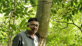 M. R. Hari near the 4.5 year old Kadamba tree in our first Miyawaki forest at Puliyarakonam
