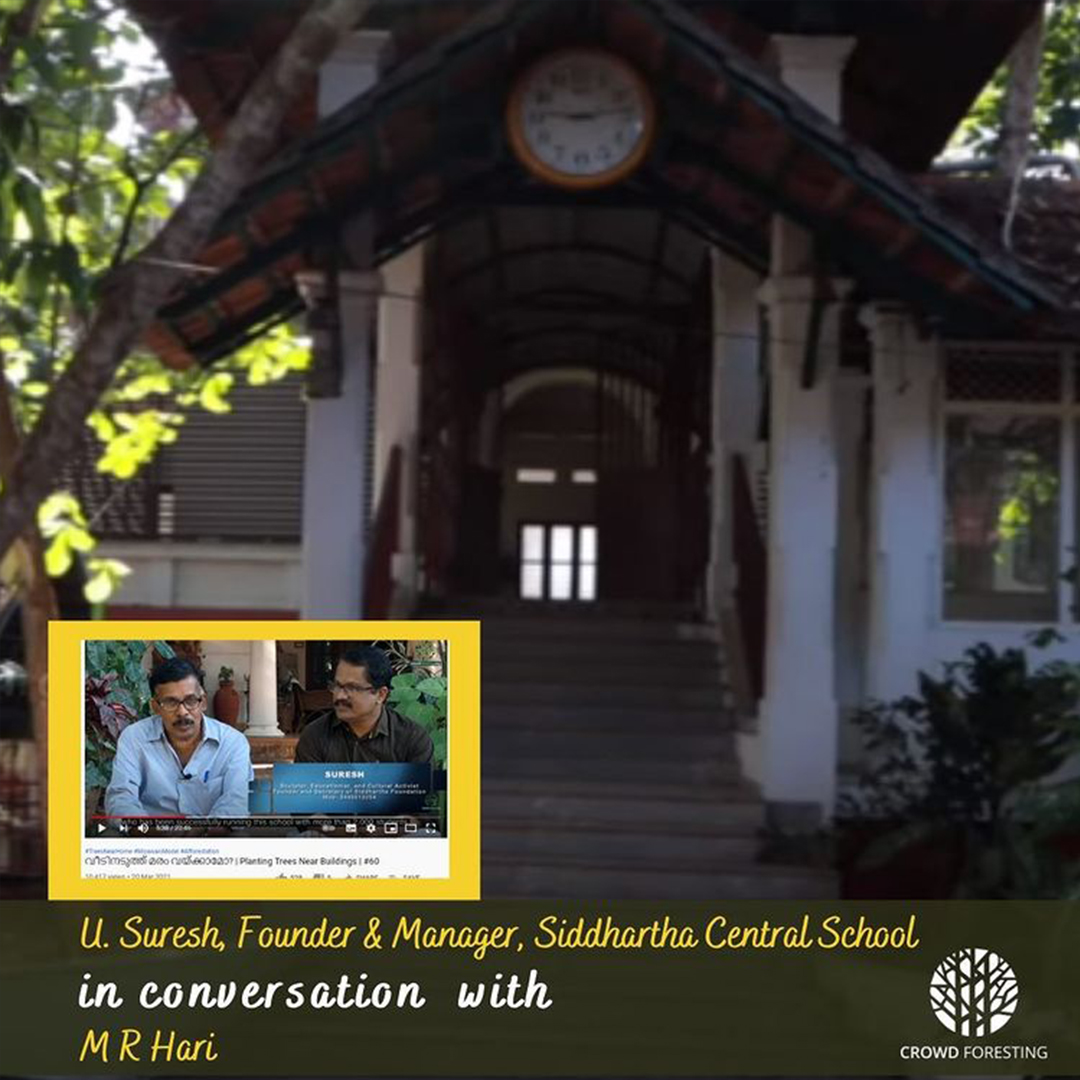 M. R. Hari having a conversation with U. Suresh about planting trees near houses/buildings